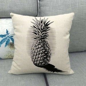 Close-up of square cotton linen pillowcase with retro hand-drawn pineapple pattern