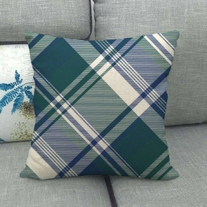 Close-up of linen-style striped plaid cushion cover with woven fabric texture