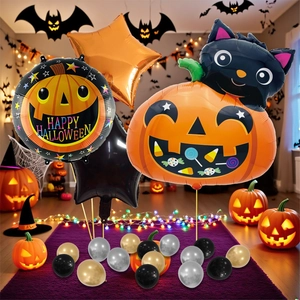 Macro view of Halloween party balloon set featuring a large pumpkin cat foil balloon