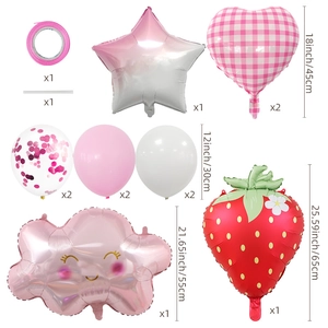 Flat lay of pink strawberry balloon set with checkered hearts and star for party decor
