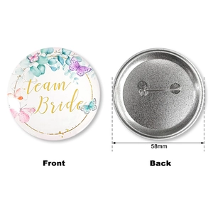 Front and back view of Team Bride tinplate badge with watercolor floral pattern