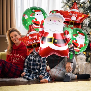Detailed view of Santa Claus and Merry Christmas foil balloons for holiday decoration