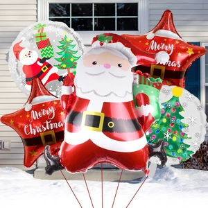 Christmas balloon set featuring Santa Claus and Merry Christmas red star balloons in snow