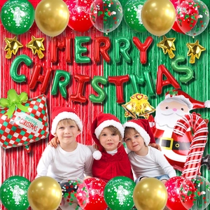 Christmas party decoration set with Merry Christmas balloons, Santa Claus and tinsel curtain