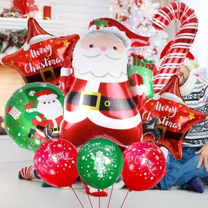 Close-up of Christmas balloon set with Santa Claus and red star foil balloons