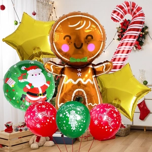 Christmas balloon set featuring Santa and Gingerbread man in a festive home setting