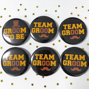 Set of 6 black and gold tinplate badges for bachelor party with Team Groom text and icons