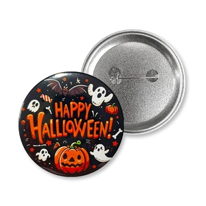 Detailed view of Halloween tinplate badge showing cartoon pumpkin design and metal pin back