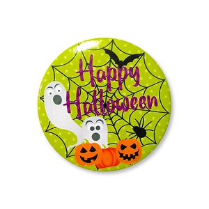 Close-up of 58mm tinplate Halloween badge with Happy Halloween text and ghost icons