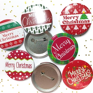 Detailed view of Christmas pin buttons featuring festive patterns and metal pin backings