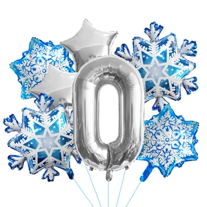 Macro detail of winter theme balloon set with silver number and blue snowflakes