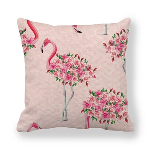 Detail of linen texture and pink flamingo with rose print on square cushion cover