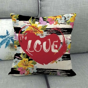Minimalist linen throw pillow cover with floral stripes and a red heart LOVE design