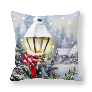 Detail of Christmas pillowcase showing snow scene with street lamp and holiday tree