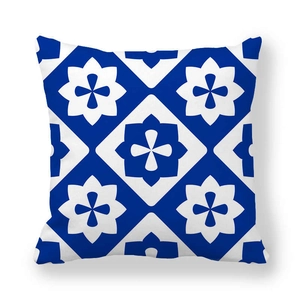 Detailed view of square pillowcase with blue and white geometric tile pattern