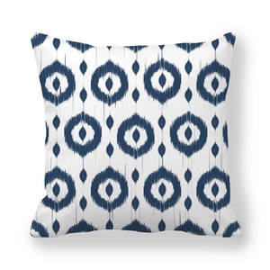 Detail of navy blue and white ikat geometric peach skin pillowcase with a soft texture