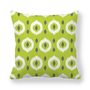 Detail of green and grey ikat geometric pattern on thick peach skin pillowcase