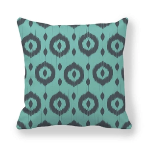 Minimalist geometric teal pillow cover with grey ethnic ikat pattern and soft texture