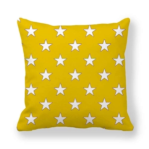 Close-up of yellow peach skin pillowcase with white star print and neat edge stitching
