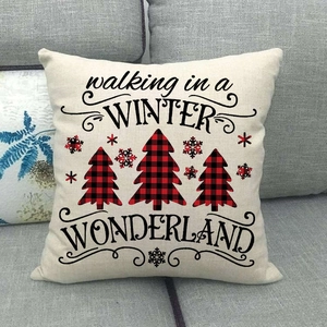 British plaid linen Christmas pillowcase with winter wonderland tree pattern on gray sofa