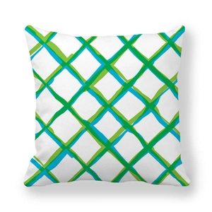 Detail of grid patterned cushion cover with artistic green and blue hand-painted lines