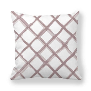 Detail of white square cushion cover featuring soft dusky pink watercolor grid pattern