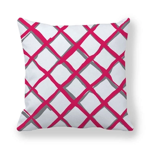 Detail of minimalist white cushion cover with magenta and grey hand-drawn grid pattern