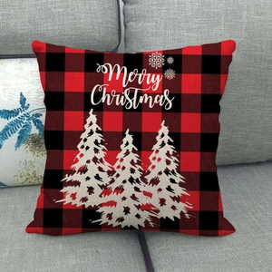 Close-up of Christmas buffalo plaid linen pillowcase with trees and Merry Christmas text