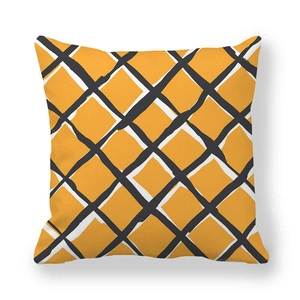 Macro detail of geometric mesh pattern on yellow and white velvet cushion cover fabric