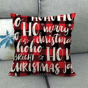 Christmas red and black buffalo plaid linen pillow cover with festive white print lettering