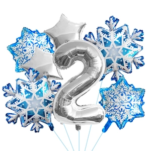 Close-up of blue snowflake and silver number 2 foil balloon set for birthday decor