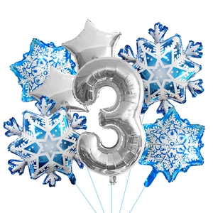 Detail of blue snowflake and silver number 3 foil balloons for frozen theme party decoration