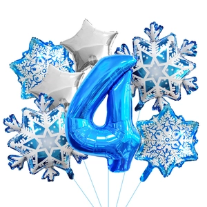 Close-up of blue number 4 foil balloon set with snowflakes and silver stars