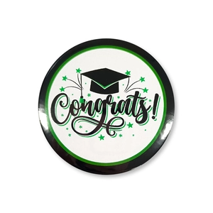 Detail of round graduation badge with Congrats text, mortarboard, and green stars design