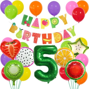 Detailed set of Hawaiian fruit-themed party decorations with balloons and birthday banner