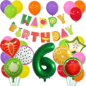 Detail of Hawaii fruit birthday party kit with letter banners and foil balloons