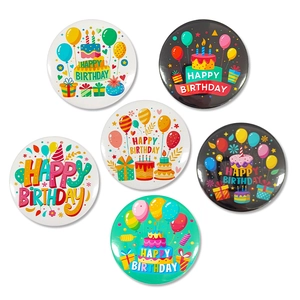 Set of six colorful Happy Birthday tinplate badges with balloons and cake party designs
