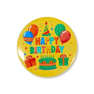 Detail of Happy Birthday tinplate badge with colorful balloons, cake and gift box elements