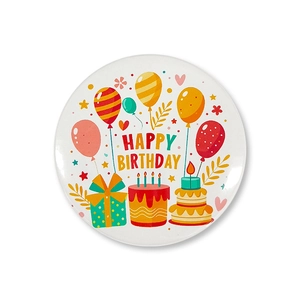 Close-up of Happy Birthday tinplate badge with colorful balloons and cake designs
