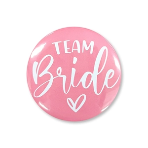 Spilla rotonda Team Bride rosa con cuore bianco per decorazione festa di nozze