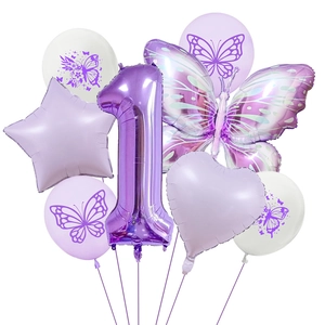 Detail view of purple butterfly balloon set including foil number one and star shapes