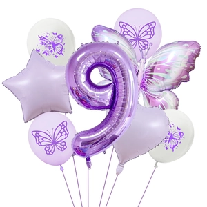 Detail of purple butterfly party balloon set with foil stars and number nine