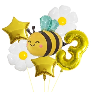 Détail de ballons abeille et marguerite avec le chiffre 3 doré pour fête d'anniversaire