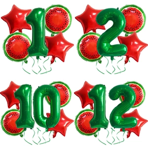 Detail of watermelon party balloon set featuring green numbers and red star foil balloons