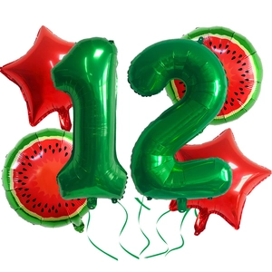 Detailed watermelon theme party set with green number balloons and red foil stars