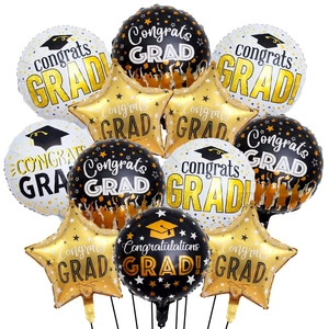 Black, gold, and white graduation balloon set with star shapes and congrats grad print