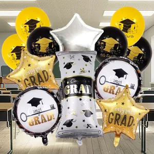 Close-up of graduation balloon set with Congrats Grad stars and black gold latex accents