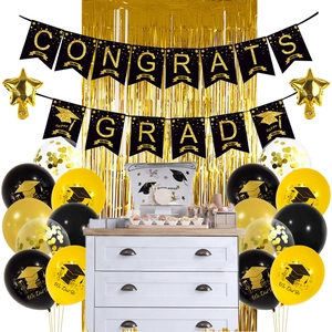 Detail of Graduation party decor set featuring CONGRATS GRAD banner and gold foil balloons