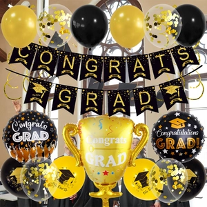 Graduation party decoration set with Congrats Grad banner, trophy balloon, and latex balloons
