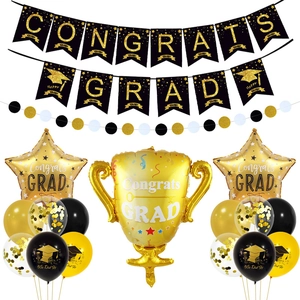 Detailed black and gold graduation party set with Congrats Grad balloons and banners